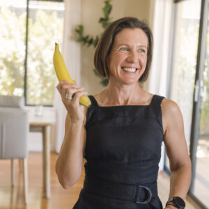 Dr Angela Genoni holding a banana
